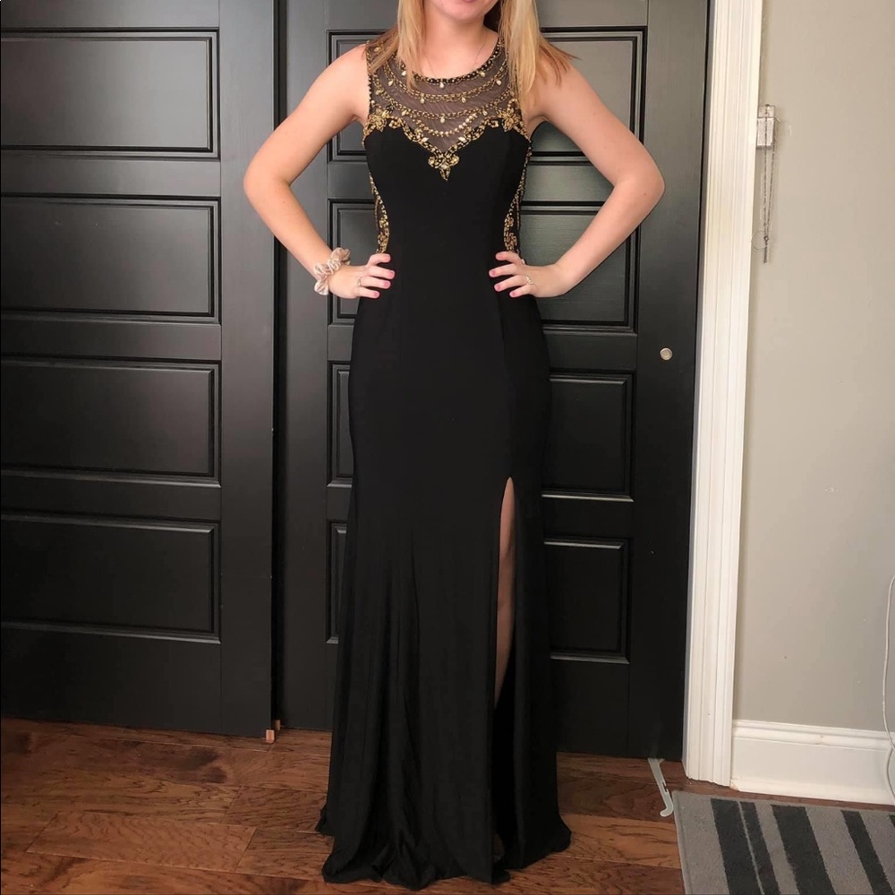 Black and gold sequin dress